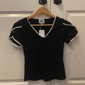 Black ribbed shirt with white dots